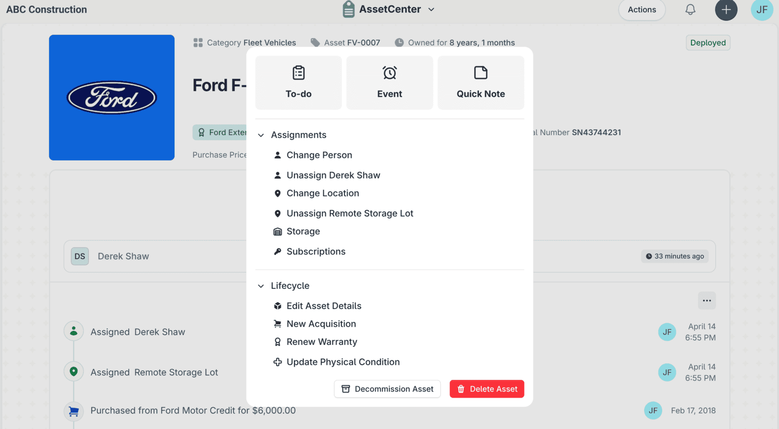The actions menu open on a Ford F-250 record in AssetCenter, offering to-do, event and quick note shortcuts alongside assignment and lifecycle actions such as change person, change location, renew warranty and decommission.