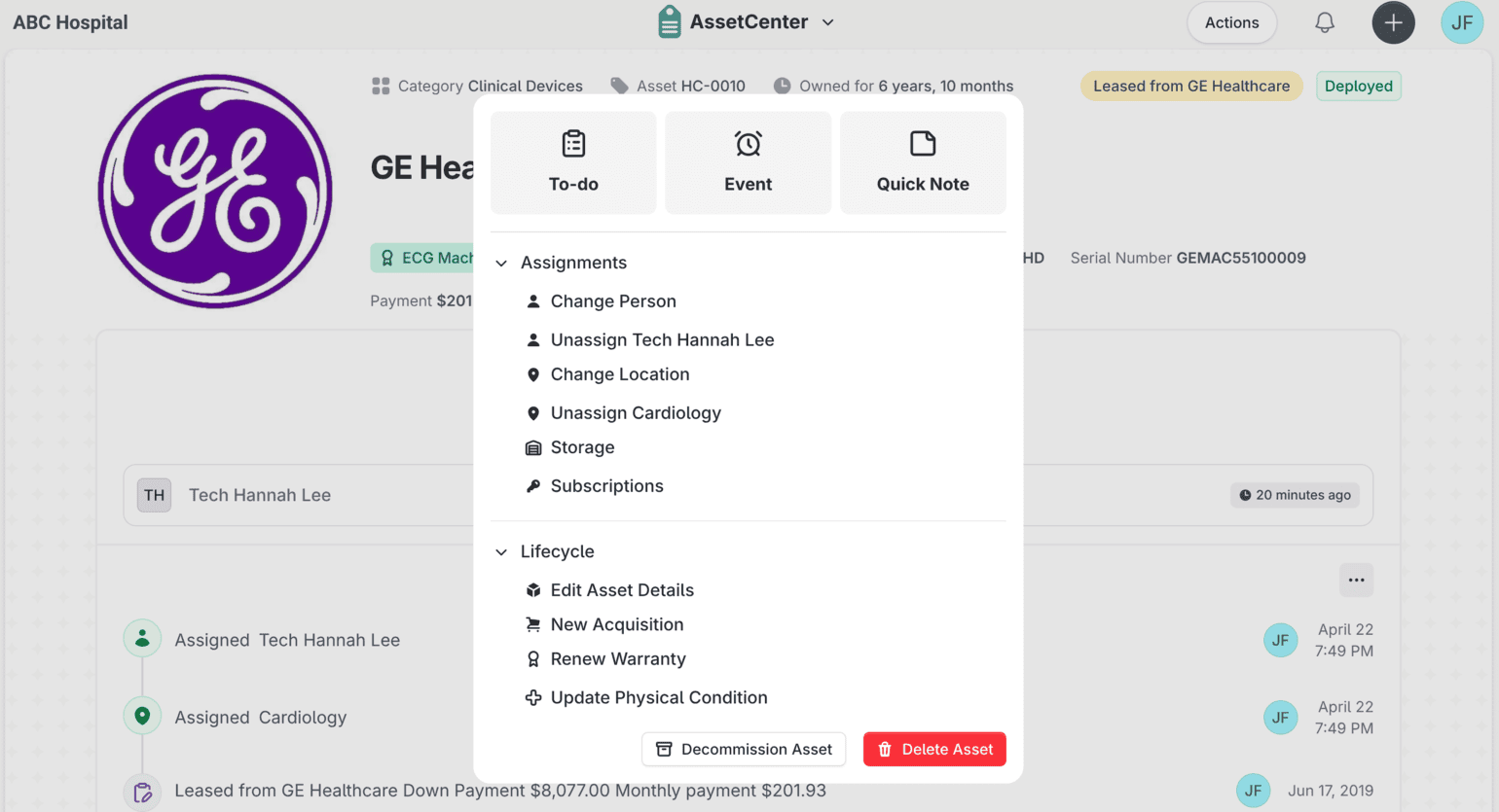 The actions menu open on a GE Healthcare device record in AssetCenter, offering to-do, event and quick note shortcuts alongside assignment and lifecycle actions.