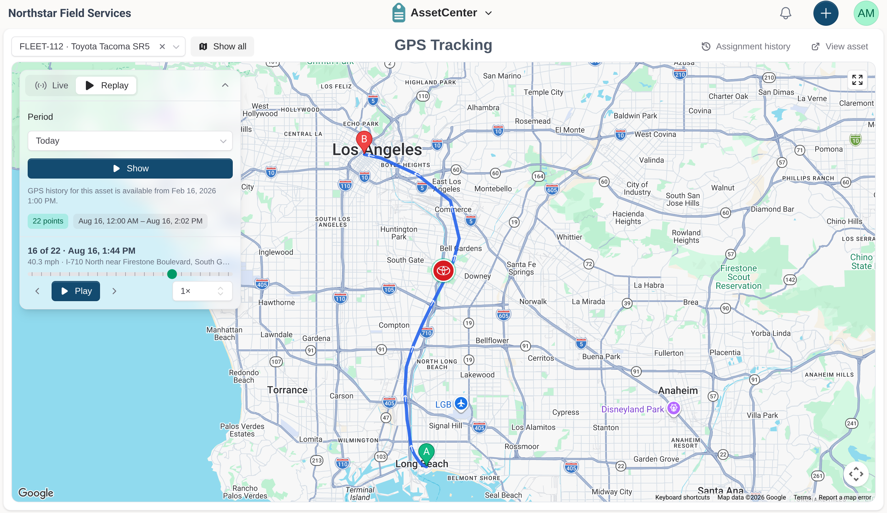 AssetCenter GPS route replay for a Toyota Tacoma, showing a recorded route through Los Angeles and Long Beach with twenty-two position points and playback controls.